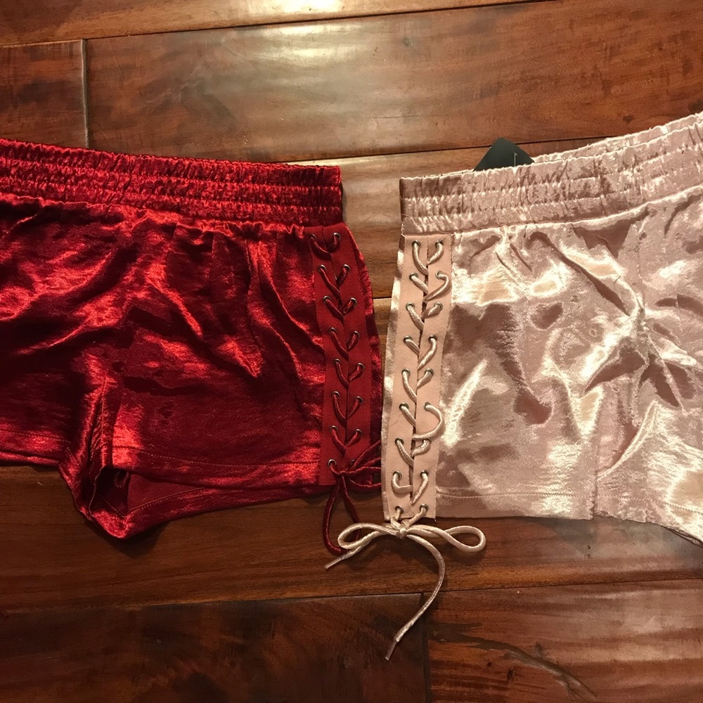 Red satin like lace up shorts NWT